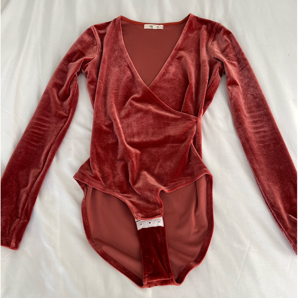 Burnt orange body suit